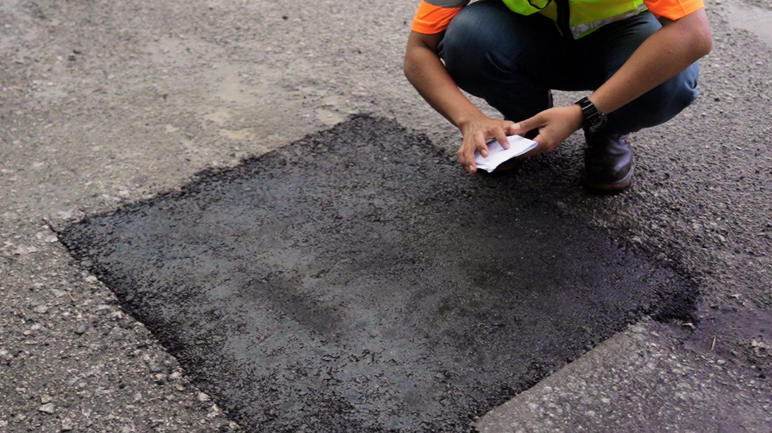 Jalan selepas ditampal dengan AC14 Cold Mix